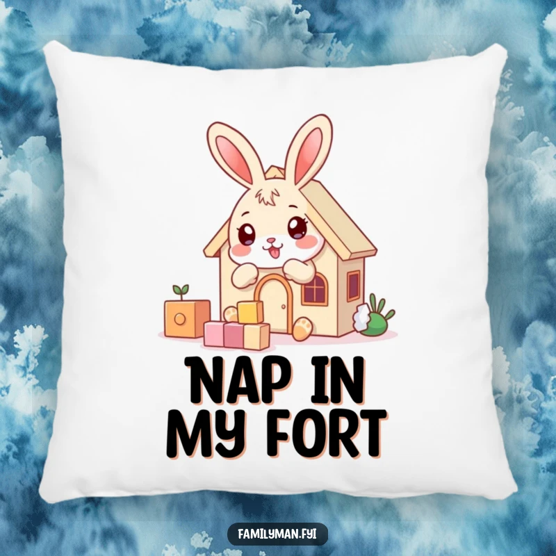 Funny playful bunny character building a house with blocks, on a soft decorative pillow.
