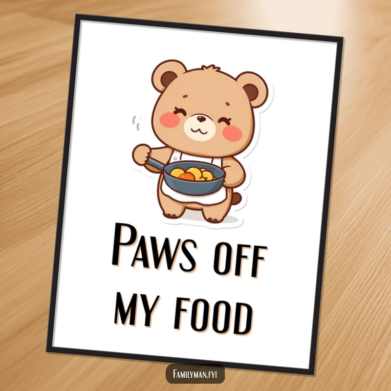 Funny cute bear character in apron, holding a frying pan with food, as wall art for a kitchen.