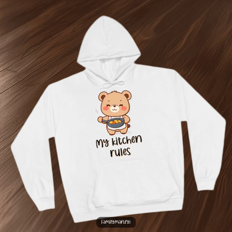 Funny cute bear character in apron, holding a frying pan with food, on a warm hoodie, for kitchen comfort.